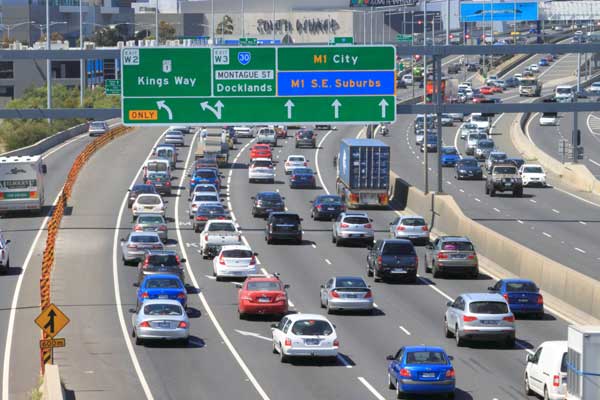 Image displays several cars on a motorway.