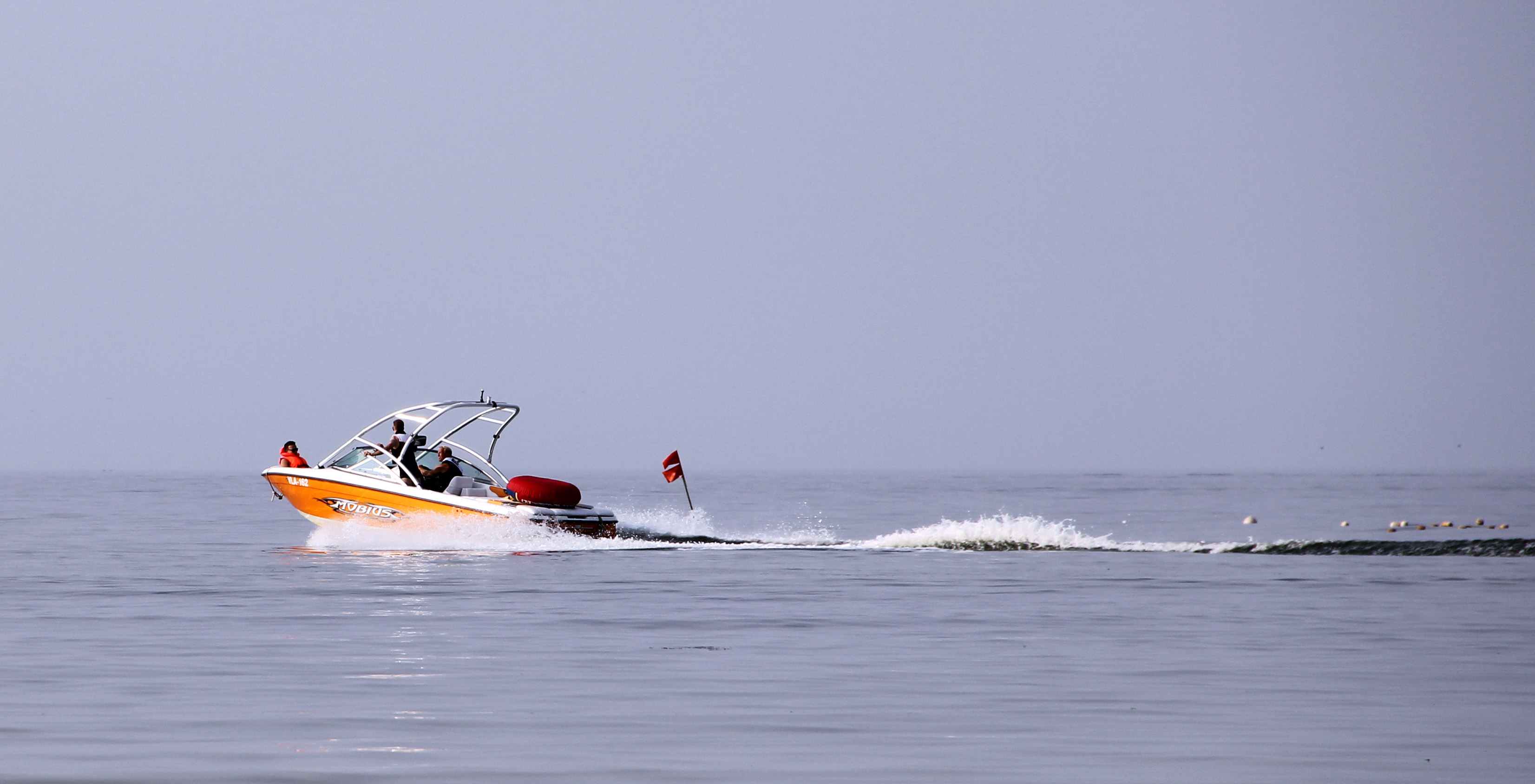 Image of a speedboat in action.