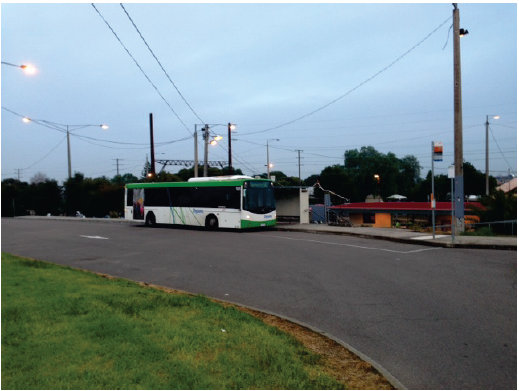 This photo shows a bus stopping at Regent station in suburban Melbourne.