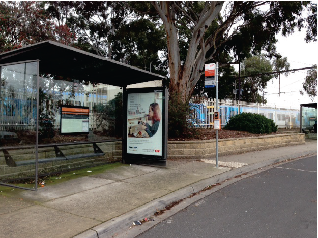 This photo shows a bus stop at Reservoir station with timetable and route information.