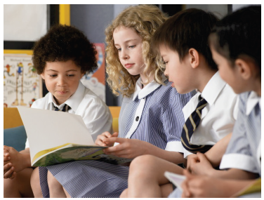 Image of students reading a book together - Photo courtesy of bikeriderlondon/Shutterstock.com.