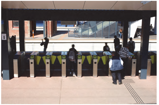 Image of exit/entry gates at a Melbourne train station.  Photograph courtesy of Public Transport Victoria.