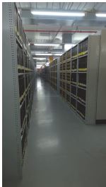 Photo of shelves full of files at PROV.