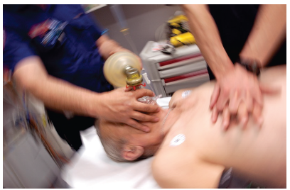 Image of CPR being performed.