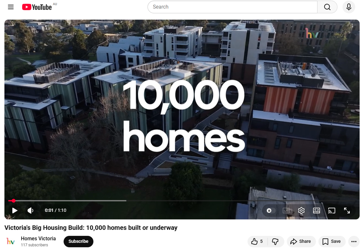 Screenshot of a YouTube video titled ‘Victoria’s Big Housing Build: 10,000 homes built or underway’, posted by Homes Victoria. The image shows a photo of a group of apartment buildings with the text ’10,000 homes’.