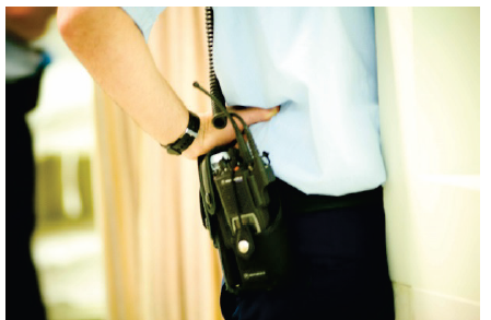 A picture of a security guard with a walkie talkie on his hip. Photo courtesy of St Vincent's Hospital Melbourne.