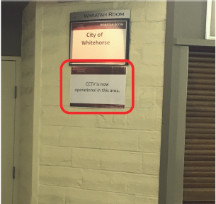 ​​​CCTV signage inside a council building.