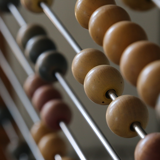 Close up of an abacus, photo by Laura J Smith/shutterstock.com