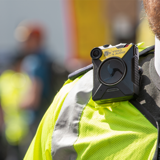 Close up of a body camera being worn by a police officer.