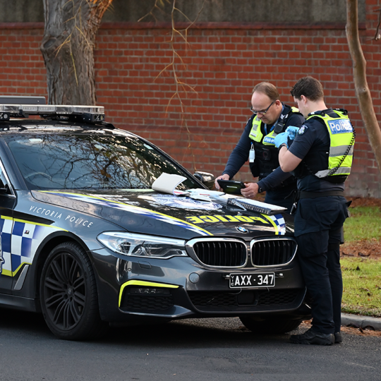 Highway patrol car with officers.