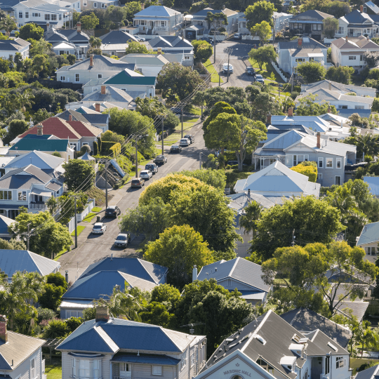 Victorian suburb with houses, trees and a road
