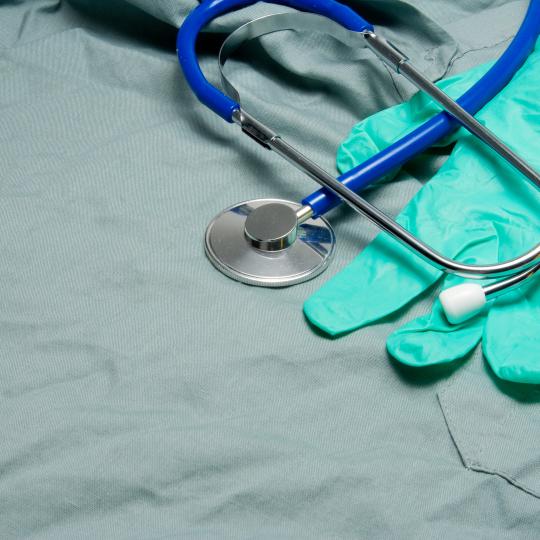 A latex glove and a stethoscope.