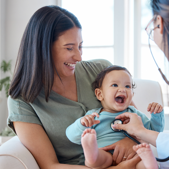 A mother and baby with a stethoscope to the chest