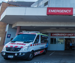Two ambulances outside Boxhill Hospital, Australia. Photocourtesy of Nils Versemann / Shutterstock.com.