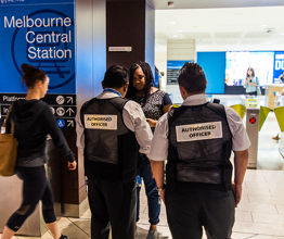 Image shows ticket inspectors watch for fare evaders at Melbourne Central Station. Photo courtesy of Nils Versemann/Shutterstock.com