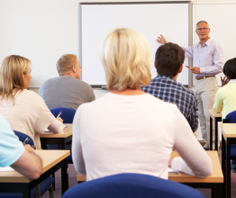 Adults in a classroom. Photo courtesy of Monkey Business Images/Shutterstock.com