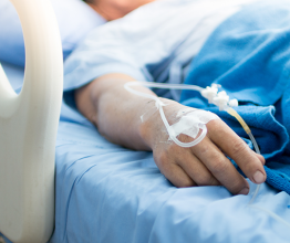 Image of the hand of a patient in hospital ward. Photo courtesy of Thaiview/Shutterstock.com