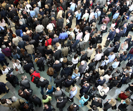 A crowd of people. Photo courtesy of Li Wa/Shutterstock.com 