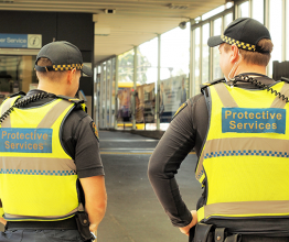 Image shows Protective Services officers at a train station. Photo courtesy of STRINGER Image/Shutterstock.com