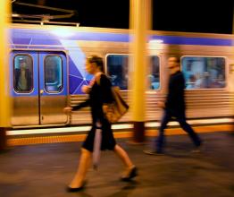Image shows Metro Trains Melbourne passengers. Photo courtesy of ChameleonsEye/Shutterstock.com