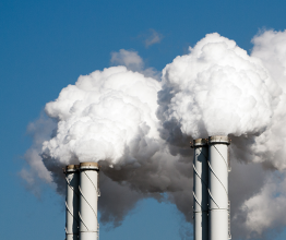 Air pollution from power plant chimneys. Photo courtesy of VanderWolf Images/Shutterstock.com