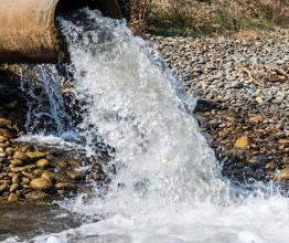 Pipe expelling water. Photo by Vastram/shutterstock.com