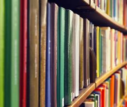 Shelves of library books. Photo courtesy of Mikael Damkier/shutterstock.com