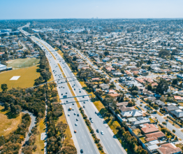 Cars driving on Monash Freeway at Wheelers Hill suburb in Melbourne, Australia - aerial view. Photo courtesy of Greg Brave/Shutterstock.com