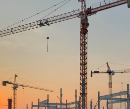 Cranes on building site.