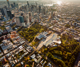 Aerial photo of the Royal Exhibition Building, Melbourne CBD and surrounding suburbs.