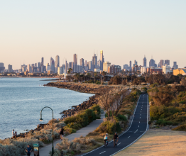 View of the Melbourne city skyline from a beachside walking track in the south-eastern suburbs.