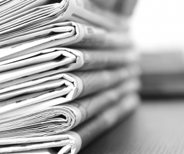 Stack of newspapers seen end-on.