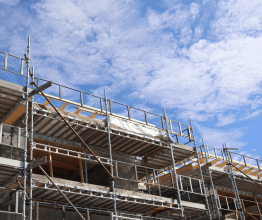 Building under construction with scaffolding 