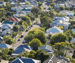 Victorian suburb with houses, trees and a road