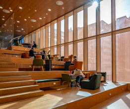 Students studying in a communal area of a Victorian university.