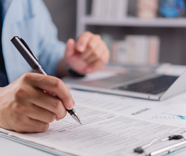 Man filling out written application