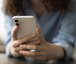 Close-up of person's hands holding a mobile phone